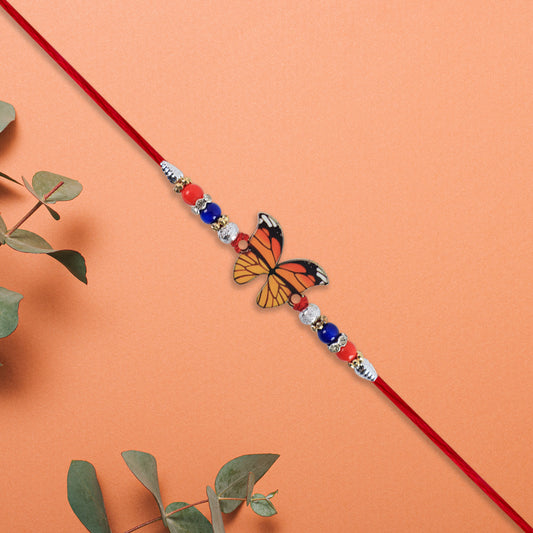 Vibrant Butterfly Rakhi With Colorful Beads  Red Mauli Thread