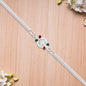 Delicate Metal Chain Rakhi With Enamel Floral Center