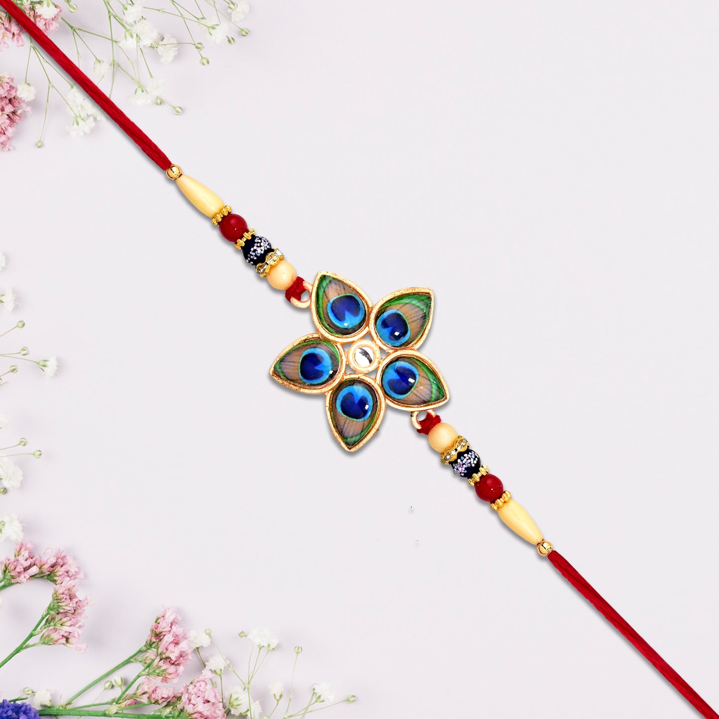 Designer Mor Pankh Rakhi In Star Shape