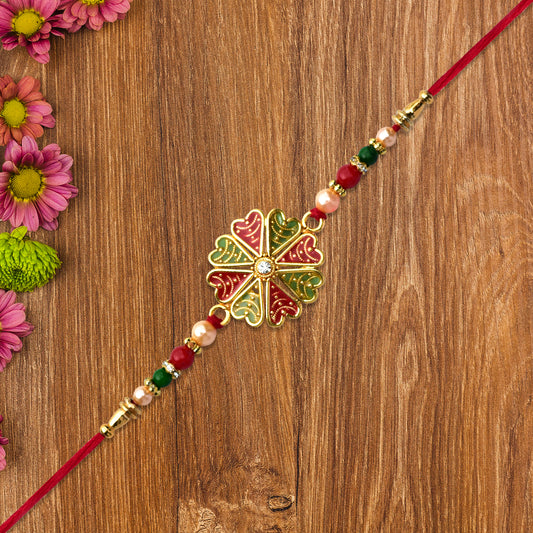 Traditional Rakhi With Bright Floral Centerpiece And Decorative Thread