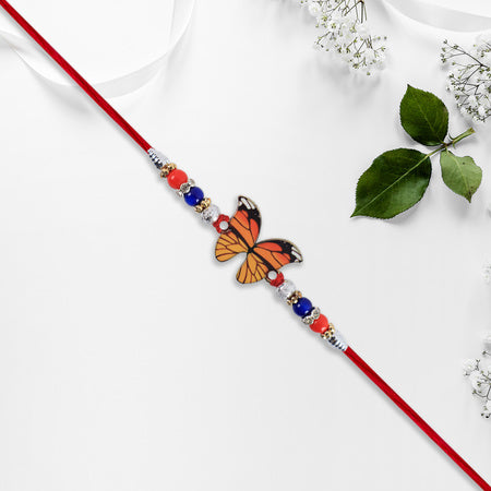Vibrant Butterfly Rakhi With Colorful Beads  Red Mauli Thread
