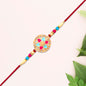Round Floral Rakhi With Pink-blue Enamel And Beaded Thread